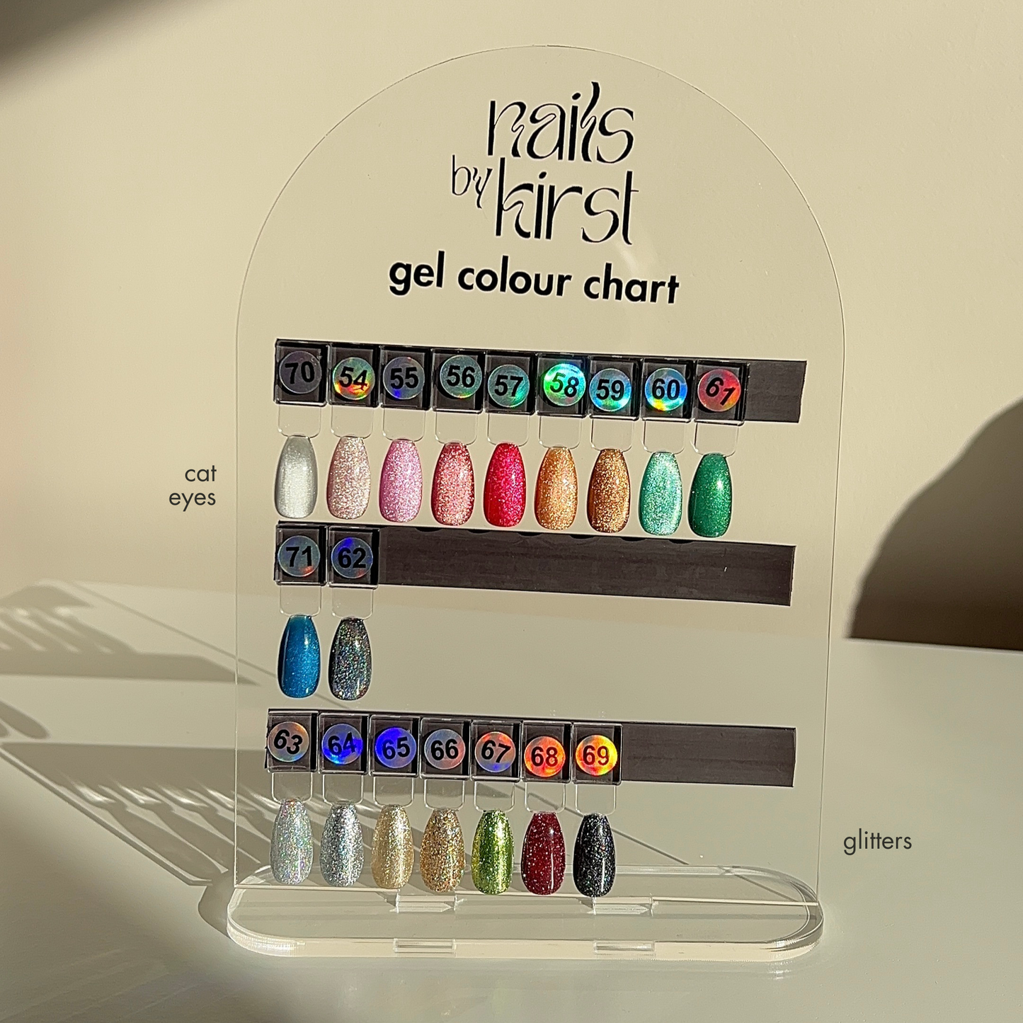 Nails by Kirst gel colour chart with various cat eye and glitter gel polish swatches