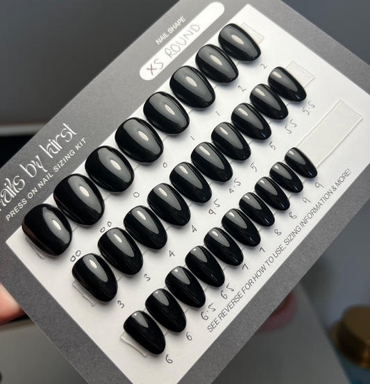 28 piece press on nail set on a cardboard backing card