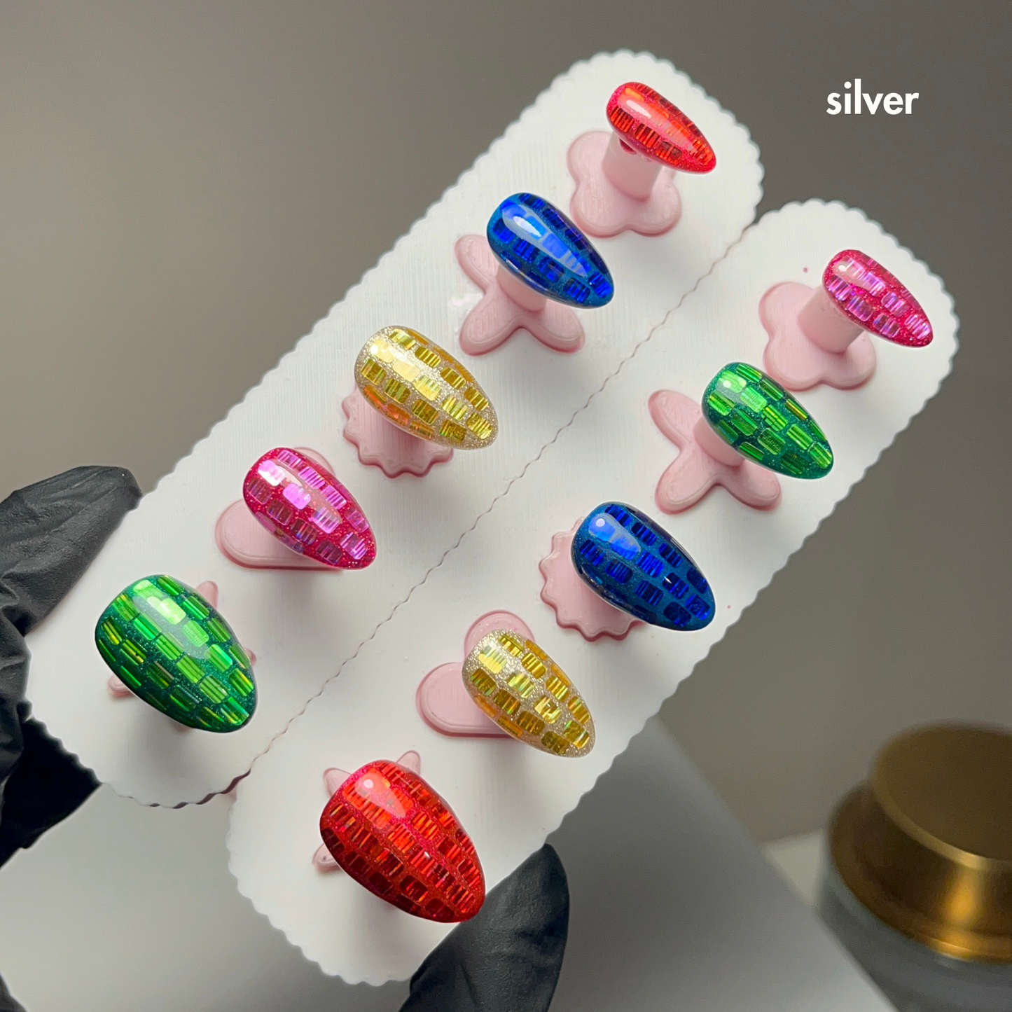 colourful disco sequin press on nails on nail stands as an example of a silver tier custom press on nail set