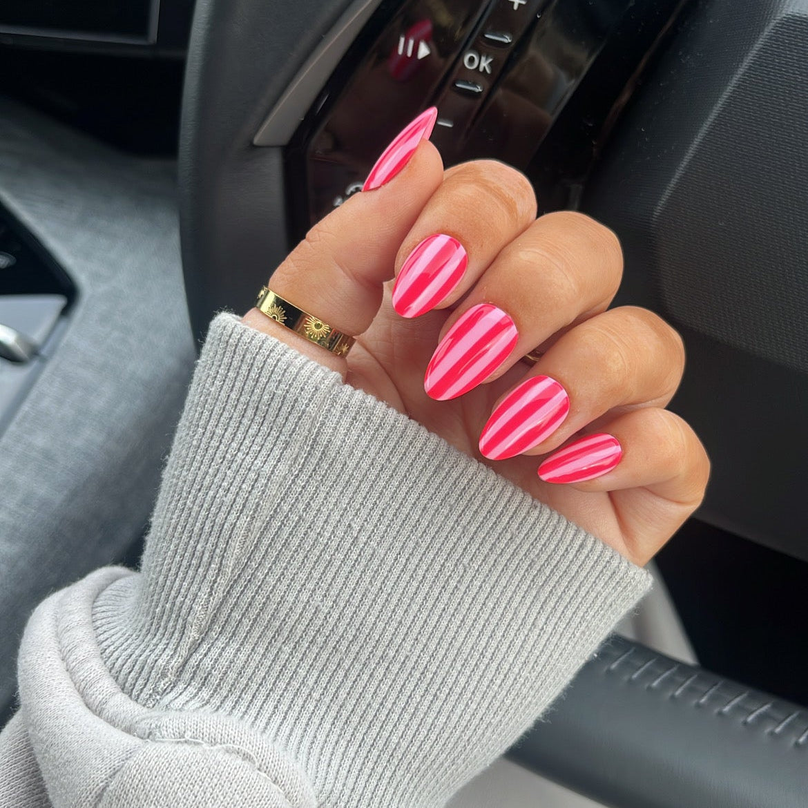 Hand with striped nails 